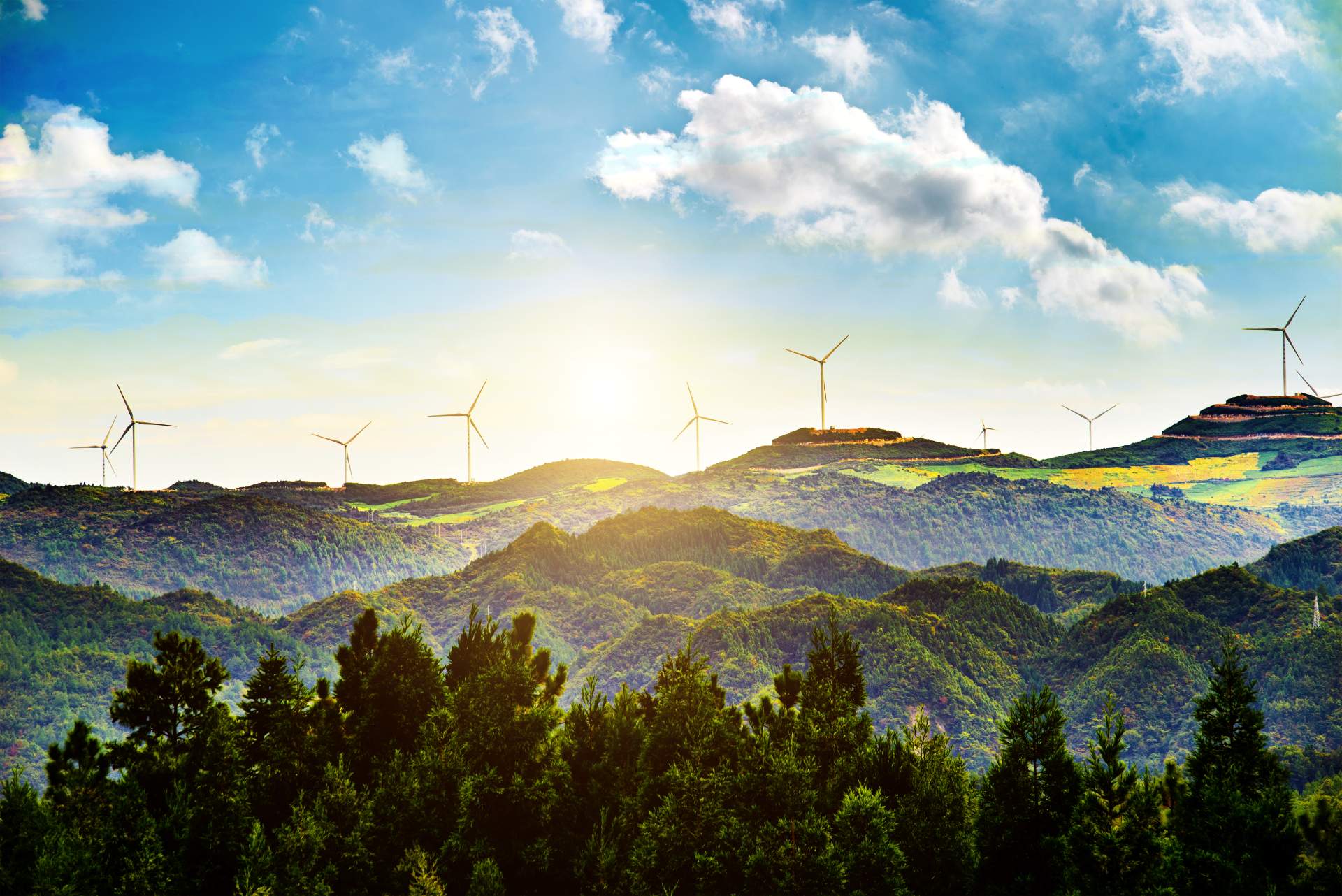 daniel-schlegel-sonnige-landschaft-mit-windmuehlen-eng